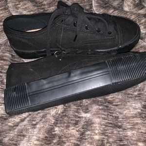 Black platform sneakers